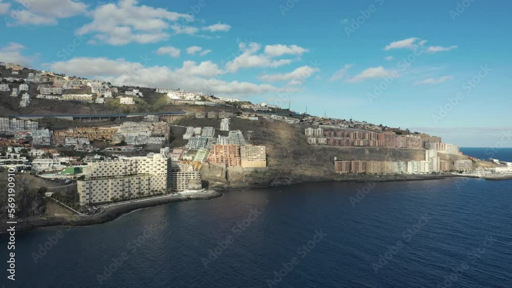 upper view resort city with hotels on rocky hills at ocean upper view resort city with hotels on rocky hills at ocean