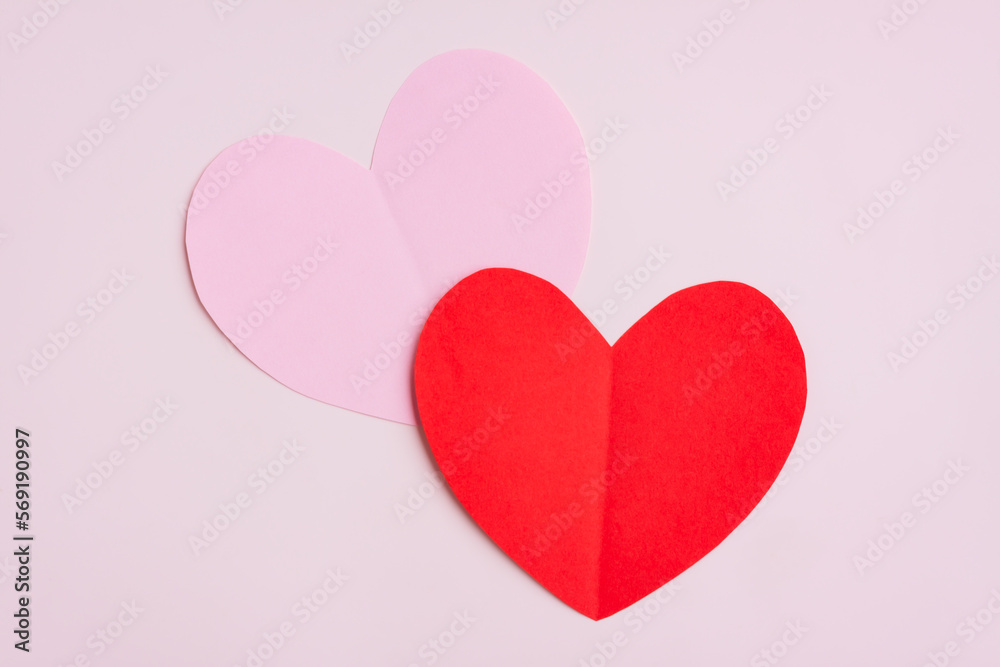 Red and Pink Paper Hearts on pink background, Heart shape papercut, Happy Valentine's day