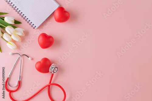 Doctors Day or World Health Day concept for background with stethoscope, red heart and checklist