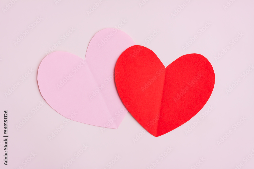 Red and Pink Paper Hearts on pink background, Heart shape papercut, Happy Valentine's day