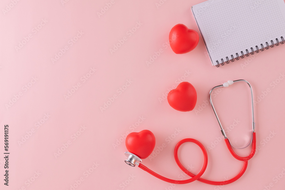 Fototapeta premium Doctors Day or World Health Day concept for background with stethoscope, red heart and checklist
