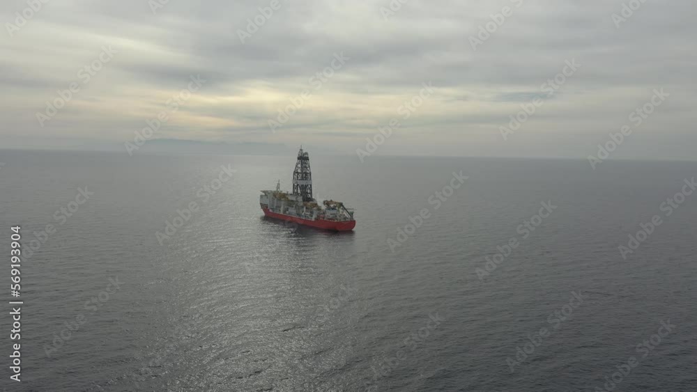 aerial view powerful freighter sails on calm ocean water aerial view powerful freighter sails on calm ocean water