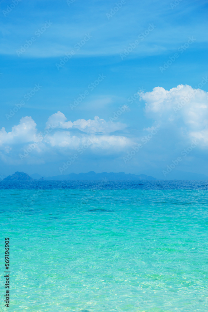 Idyllic view of the ocean and sky. Blue sea background. Phuket, Thailand. Traveling concept.