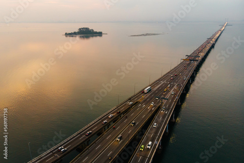 Aerial view of Penang bridge during sunrise.