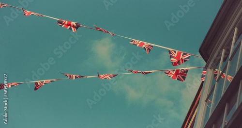Union Jack flags flying from houses in the streets of England, Great Britain 