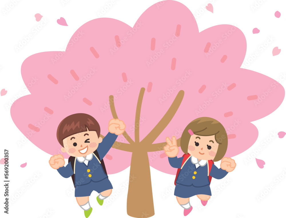 満開の桜の木の前でジャンプする小学生　入学式