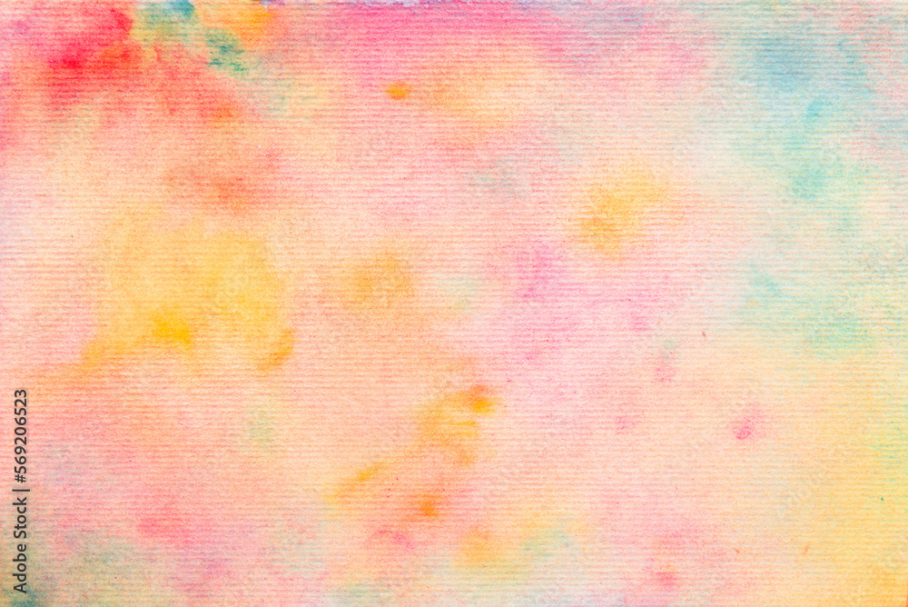 Blue, orange, green, pink, red and yellow watercolor paint on paper background.