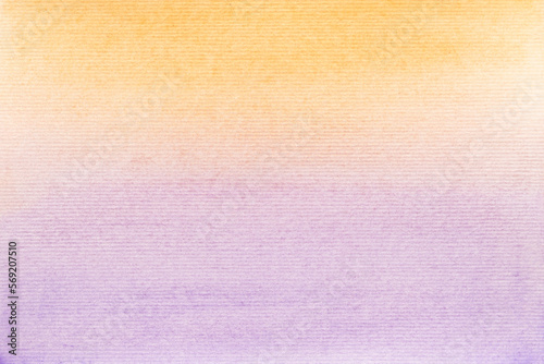 Yellow, orange and purple watercolor paint on paper background.