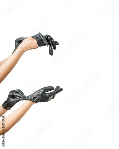 hands put on black rubber gloves, on a white background, close-up,process of putting on rubber gloves