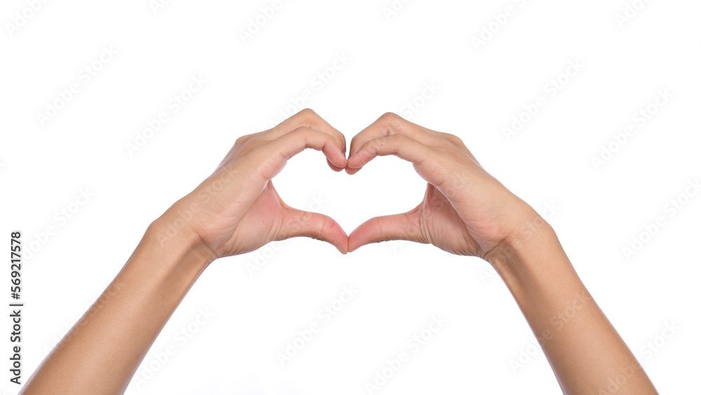 Obraz premium Woman hands making a heart shape on a white isolated background