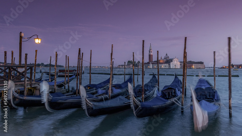 Venice, Italy. European city of Venice, tourist destination famous for canals, gondolas and history. Gondola at sunset at San Marco Square