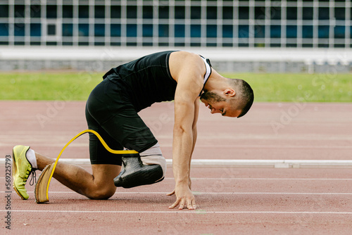 Photography disabled athlete start on stadium track