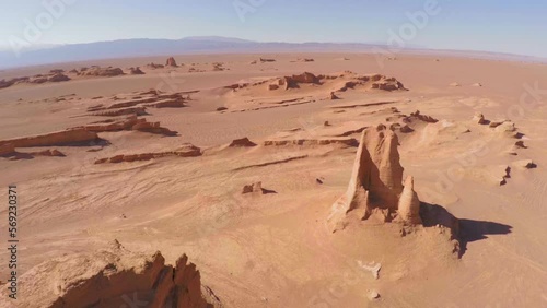 Cinematic aerial top view of Kalut Shahdad desert rock formation Iran
