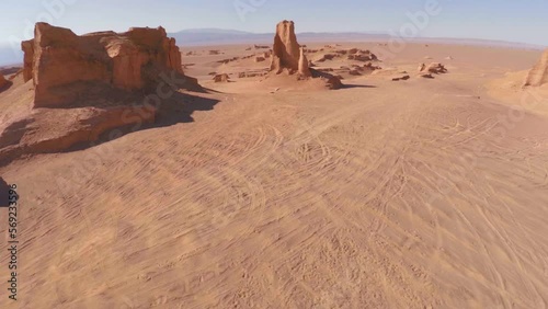 Cinematic aerial top view of Kalut Shahdad desert rock formation Iran