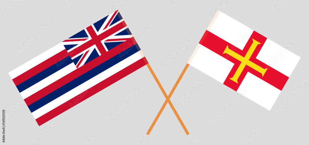 Crossed flags of The State Of Hawaii and Bailiwick of Guernsey. Official colors. Correct proportion