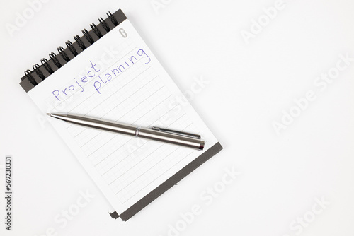 Project plan notes with metal pen - Productivity plan - Business and self improvement