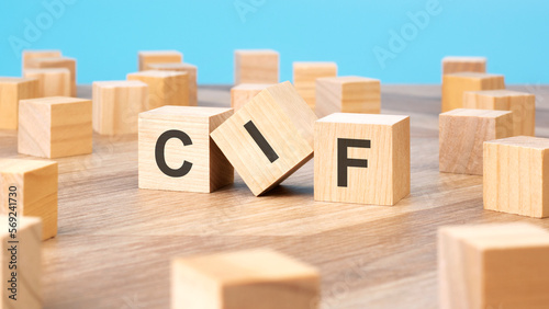 CIF written on wooden cube, business concept