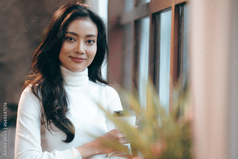 Portrait of young confident smiling Asian business woman leader, successful entrepreneur, elegant professional company executive ceo manager, working in co-working space business office