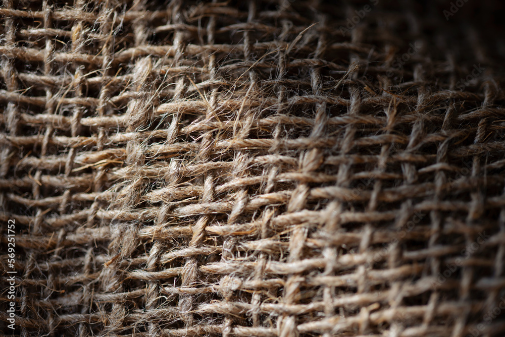 Texture of burlap fabric in sunlight. Texture of burlap fabric in sunlight.