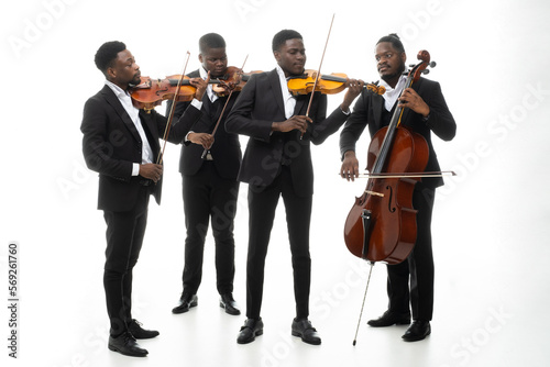 Studio portrait of a string quartet on a white background. African americans photo