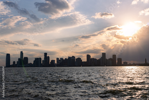 Beautiful Sunset over the Hudson River with the Silhouette of the Jersey City New Jersey Skyline © James