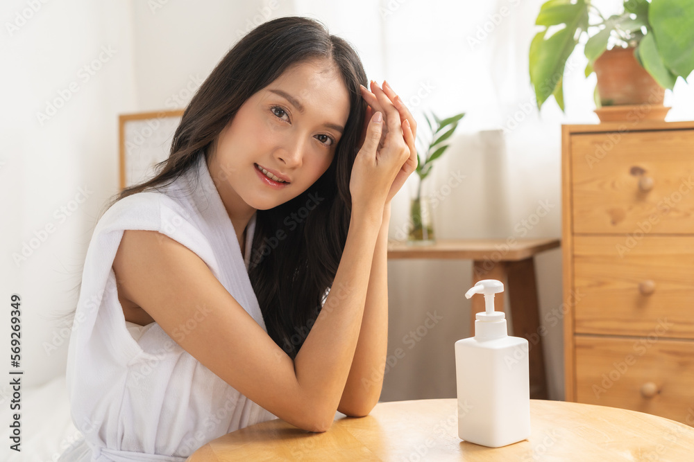 Beauty, beautiful asian young woman, girl wearing bathrobe, looking at camera, long hair with clean fresh skin. Cosmetology of face care, facial spa treatment. People look with natural fashion style. Beauty, beautiful asian young woman, girl wearing bathrobe, looking at camera, long hair with clean fresh skin. Cosmetology of face care, facial spa treatment. People look with natural fashion style.