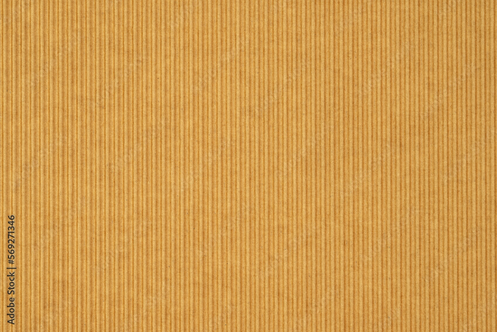 A sheet of brown decorative paper with visible corrugations A sheet of brown decorative paper with visible corrugations