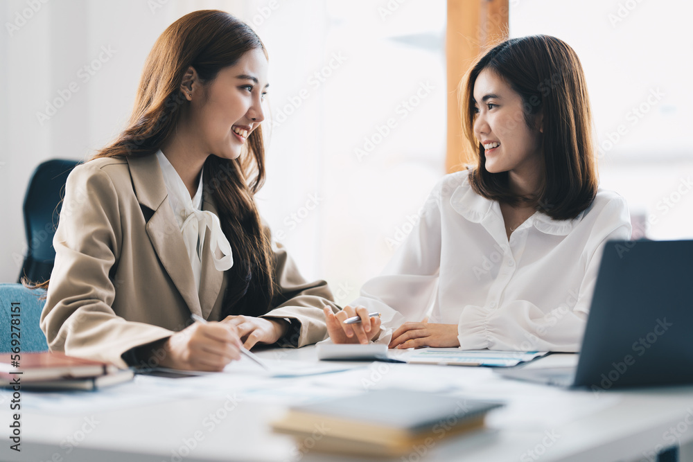 At meeting room. Success Business woman showing the vision and consult to her business team. At meeting room. Success Business woman showing the vision and consult to her business team.