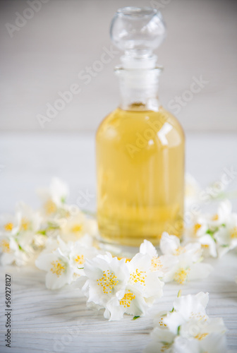 medicinal herbal tincture with jasmine in a glass bottle