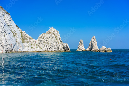 The two sister coast in Riviera del Conero from the boat. Ancona, Italy