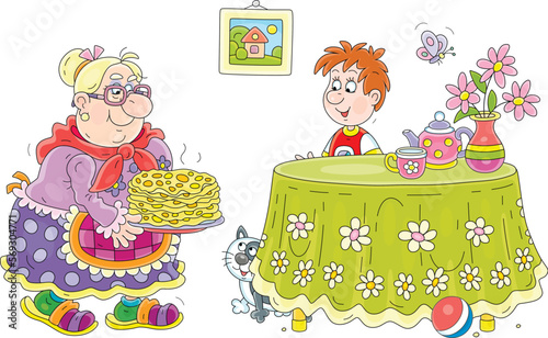 Granny treating her little grandson with hot tasty pancakes at a kitchen table with a tea set, garden flowers in a vase and a beautiful tablecloth, vector cartoon illustration on a white background