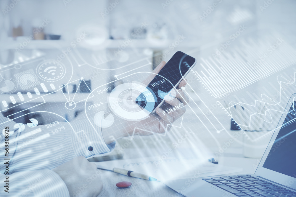 Double exposure of man's hands holding and using a digital device and tech theme hologram drawing. Technology concept. Double exposure of man's hands holding and using a digital device and tech theme hologram drawing. Technology concept.