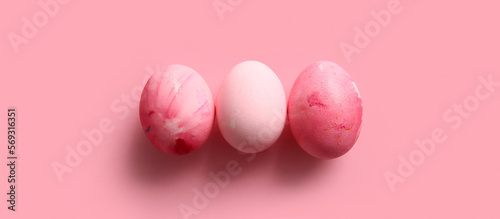 Beautiful painted Easter eggs on pink background © Pixel-Shot