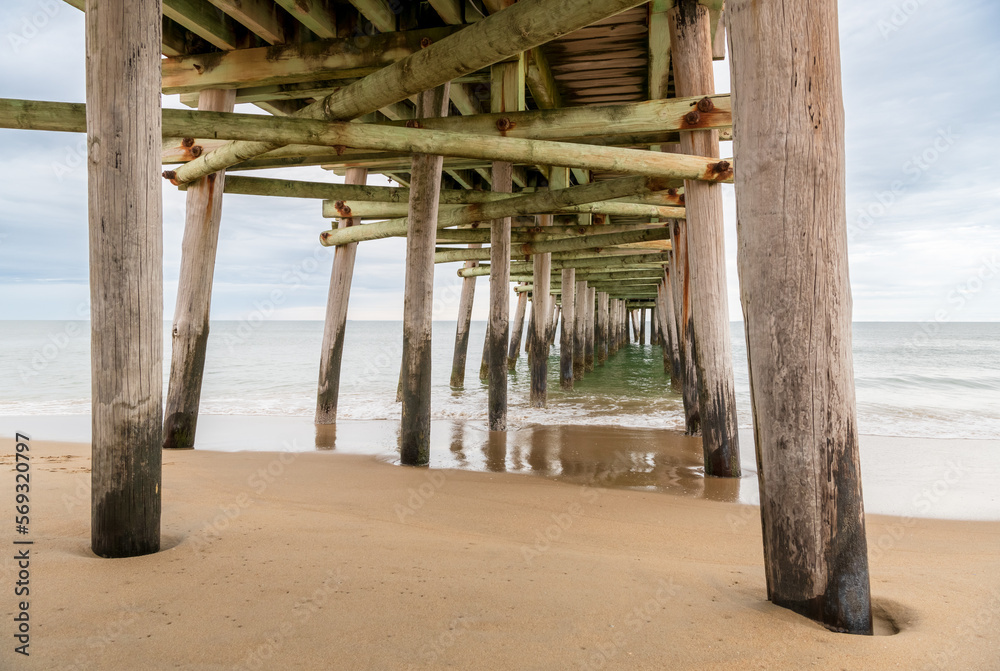 The Little Island Fishing Pier at Sandbridge is on the Atlantic Ocean side, just north of the Back Bay National Wildlife Refuge. Here it is shown on a peaceful quiet winter day just before sunset. 