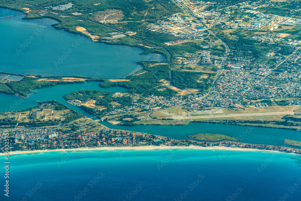 Aerial Landscape view of area around Varadero Peninsula and Santa Marta with parts of old Santa Marta Airport, Laguna de Paso Malo and a long tropical beach 