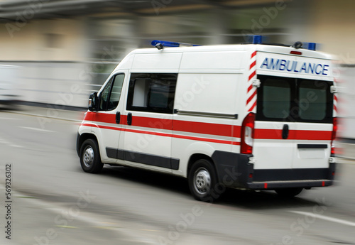 Ambulance in motion on the right
