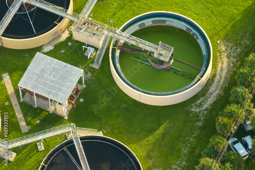 Aerial view of modern water cleaning facility at urban wastewater treatment plant. Purification process of removing undesirable chemicals  suspended solids and gases from contaminated liquid