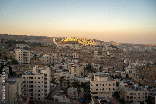 Old Bethlehem Cityscape in the Foreground and Newer Colonies in the Background with White Stone Classic Architecture