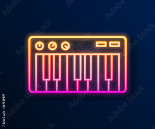 Glowing neon line Music synthesizer icon isolated on black background. Electronic piano. Vector