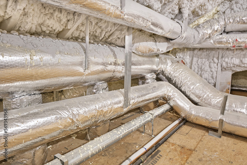 Foam insulated attic walls and flexible insulated ducts for heating and air conditioning photo