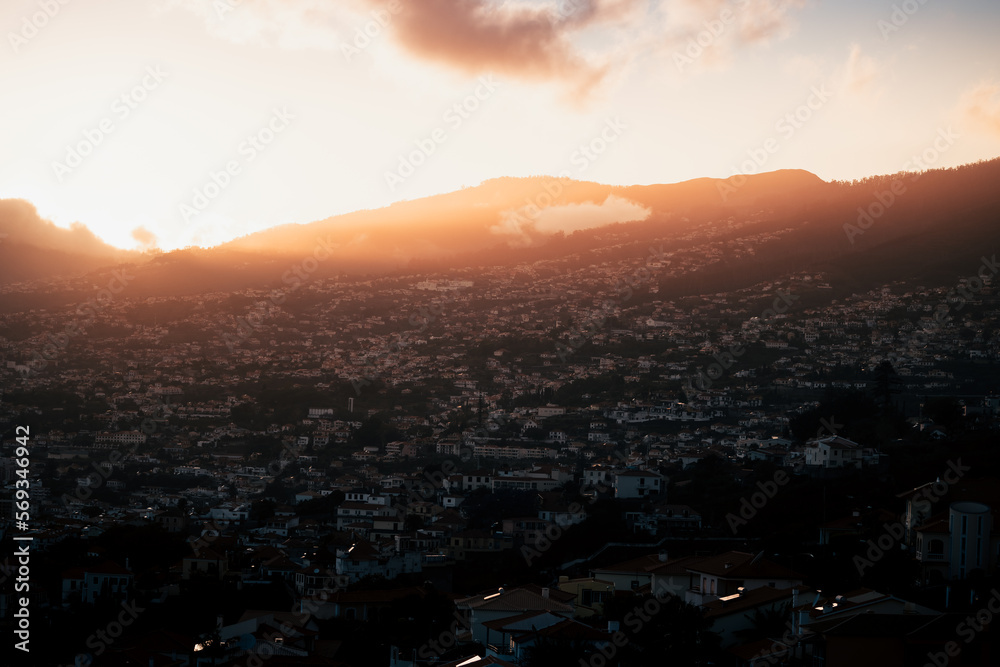 drone view of funchal night city, lights and darkness