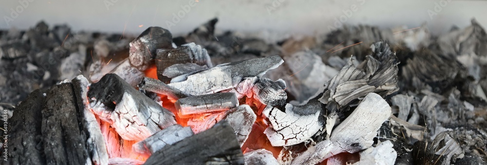 Coal, embers and flames on white background Coal, embers and flames on white background