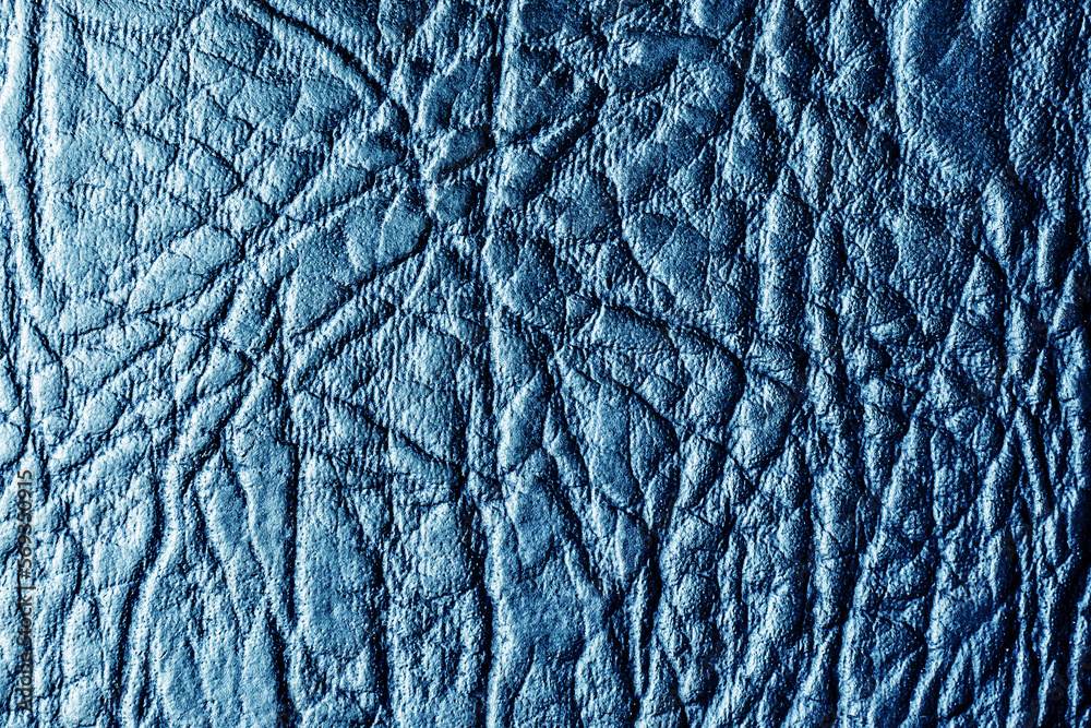 Blue color leather fabric. Fashion pattern background. Black textile texture. Blue color leather fabric. Fashion pattern background. Black textile texture.