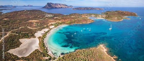 Sardegnia island nature scenery and best beaches. Aerial drone panoramic view of  beautiful Brandinchi beach over sunset. Italy summer holidays photo