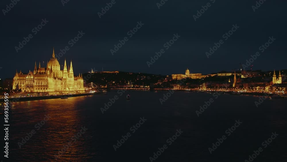 Parliament Budapest, with Danube river at night Parliament Budapest, with Danube river at night