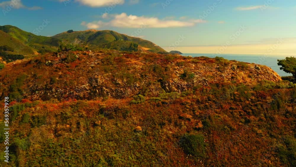 Aerial Scenic View Of Famous Bridge Seen From Mountain, Drone Flying Forward On Sunny Day Under Clouds - San Francisco, California