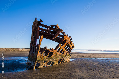 The wreck of the Peter Iredale, 100-year-old shipwreck abandoned in Clatsop Pit, Fort Stevens State Park, Astoria, Oregon, USA photo