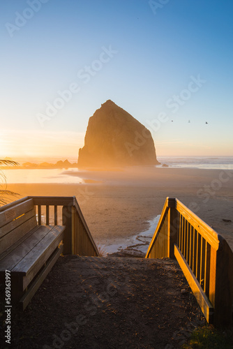 Haystack Rock at sunset from the desk in Cannon Beach, Oregon photo