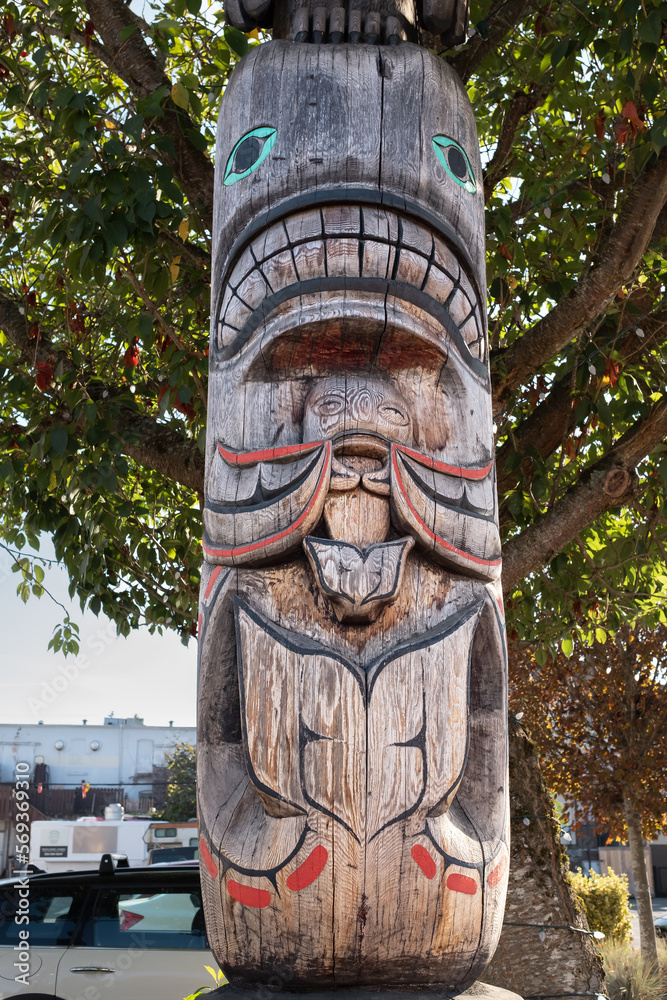 Detail of totem pole at tourist travel attraction in Duncan city. An