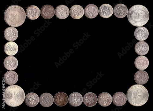 Frame made of old Dutch coins of one guilder and 10 guilders with empty black space